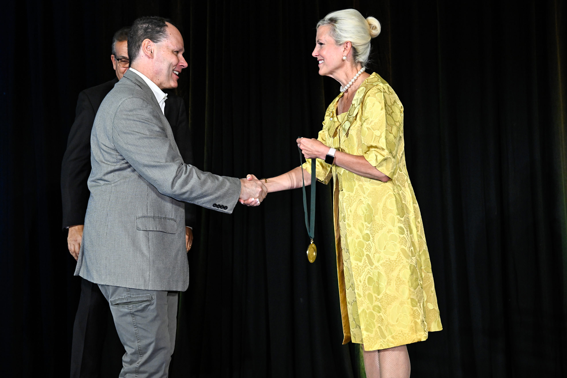  Dr. Gerard Coté receiving award