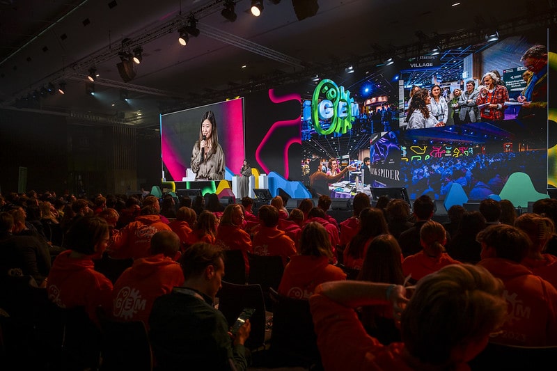 View of packed auditorium at an iGEM event