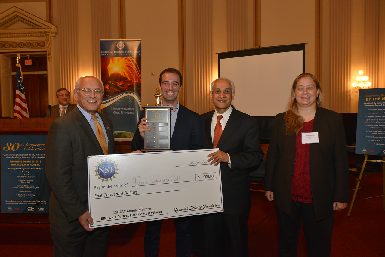 Pablo Guimera Coll, winner of the 2015 ERC-wide Perfect Pitch contest, with the $5000 first-prize check and Lynn Preston trophy, presented by Rep. Paul Tonko (D-NY) and Dr. Pramod Khargonekar, AD for Engineering, NSF, with QESST Center Director Christiana Honsberg.