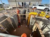 Installation of piles during a pit test.