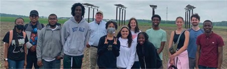 CISTAR REU and REM students learn about the integration of photovoltaics and agriculture at the Agronomy Center for Research and Education.