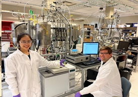 Laboratory reactor with CISTAR students (Wei-Ling Huang (L) and Kurt Russel (R) converting ethylene into diesel fuels.