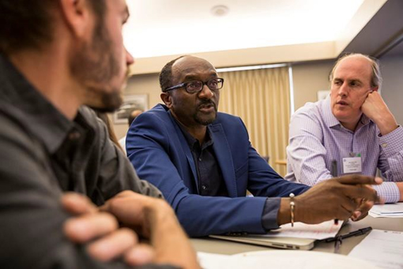 Sam Kassegne (center), CNT faculty member at SDSU and co-leader of the CNT's Communication and Interface thrust, leads research on glassy carbon electrode development.