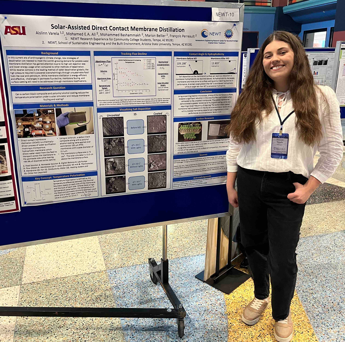 Figure 2: NEWT NERC REU student, Aislinn Varela, at a poster session in August 2022.