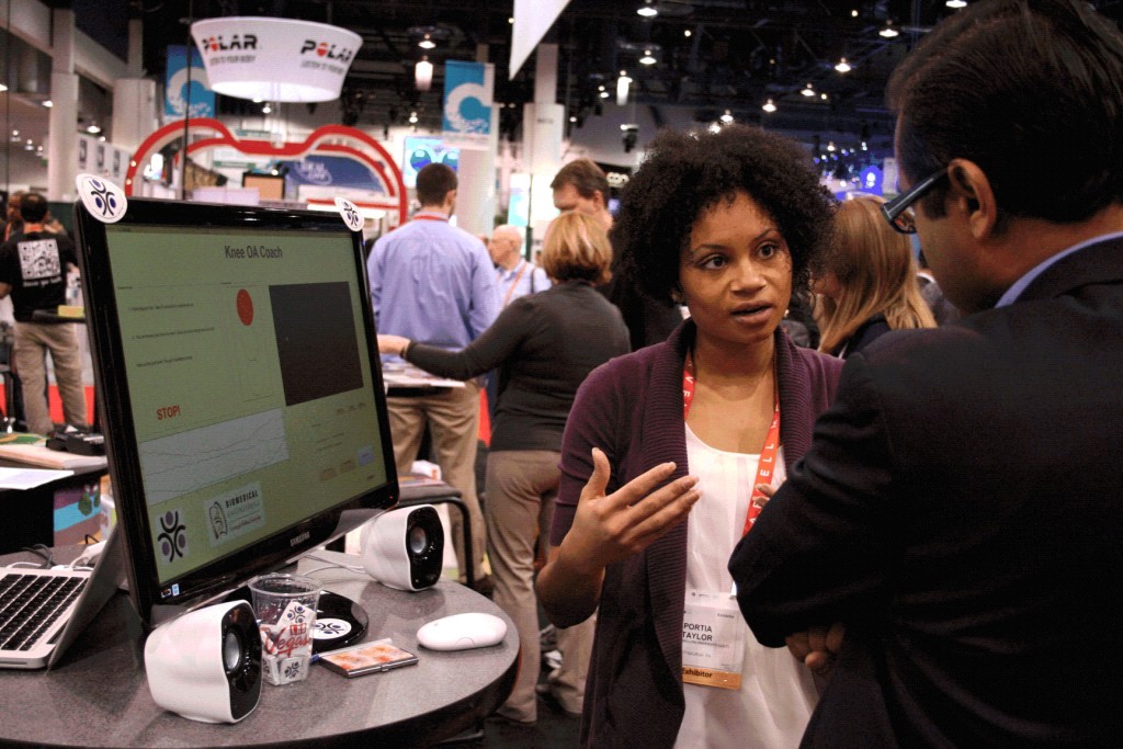 An ERC graduate student presentes her research to an industry representative at the Consumer Electronics Show (CES) in Las Vegas